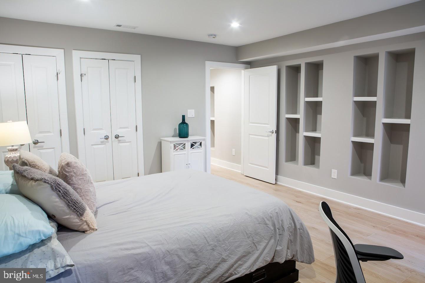 720 East Capitol Street Northeast Washington, DC 20003 - Photo 11 of 12 a bedroom with a bed and a window