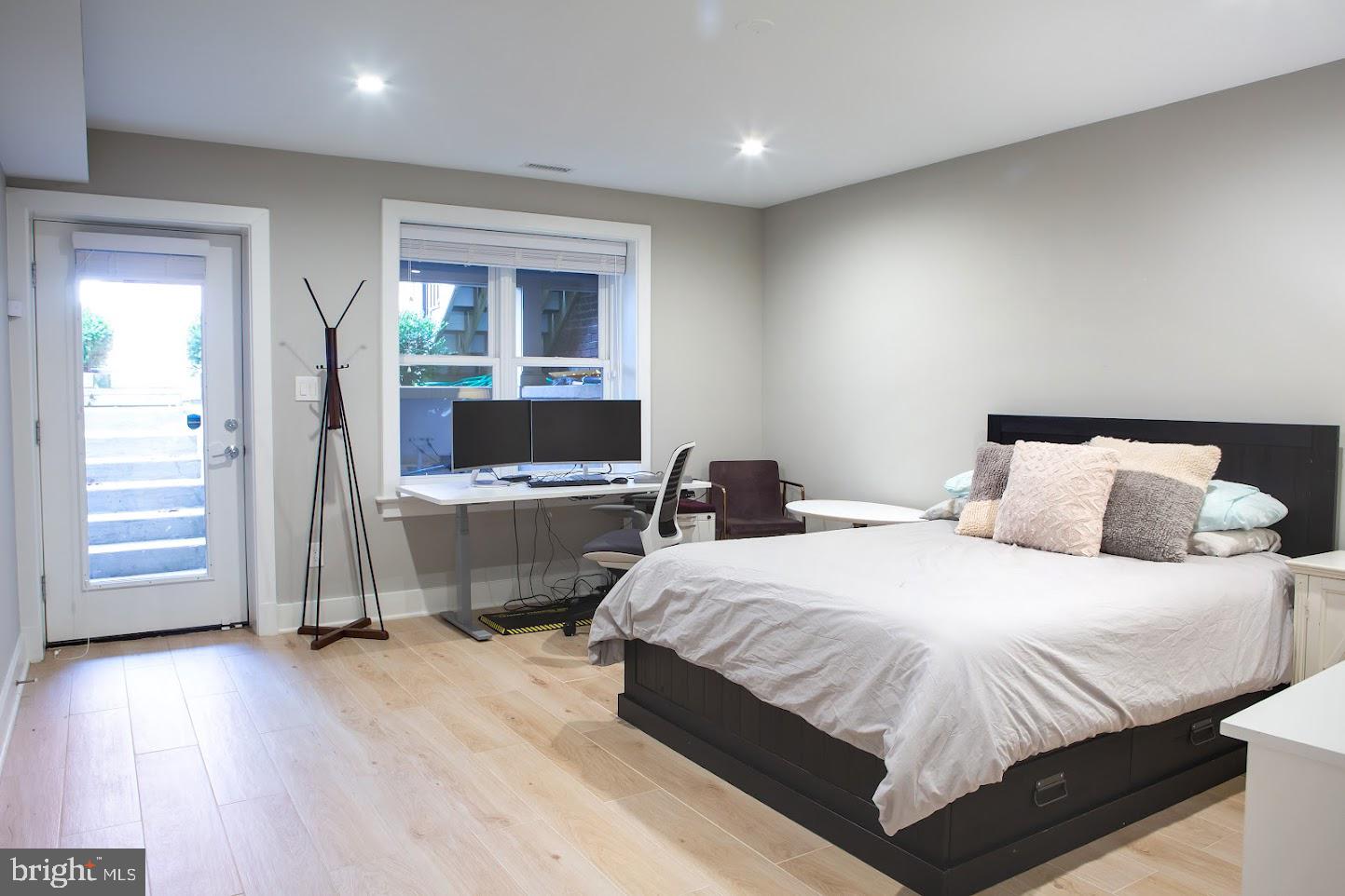 720 East Capitol Street Northeast Washington, DC 20003 - Photo 9 of 12 a bedroom with a large bed and a view of bedroom