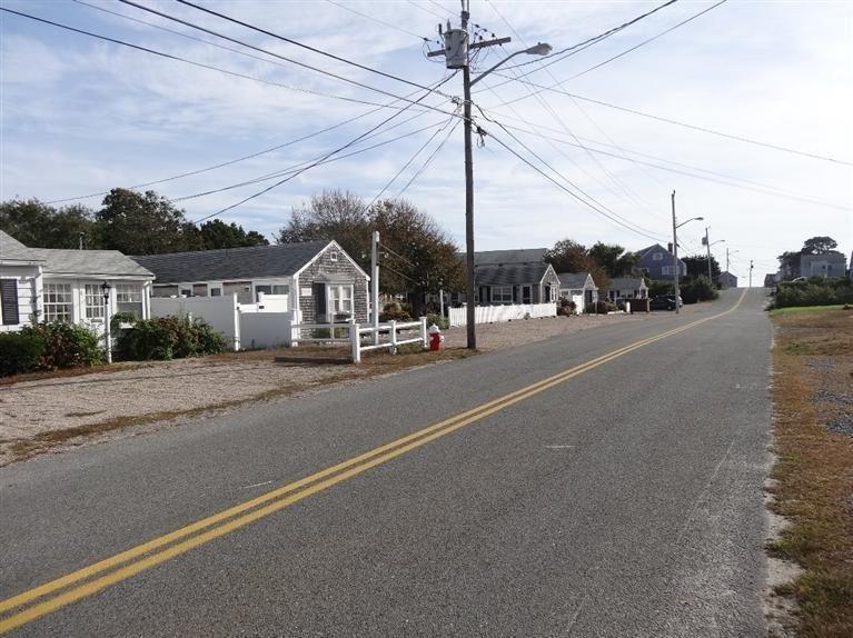 191 Captain Chase Road Dennis Port, MA 02639 - Photo 3 of 16 a view of a city street with a road