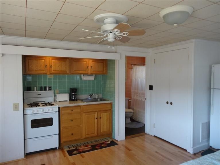 191 Captain Chase Road Dennis Port, MA 02639 - Photo 7 of 16 a view of a room with washer and dryer