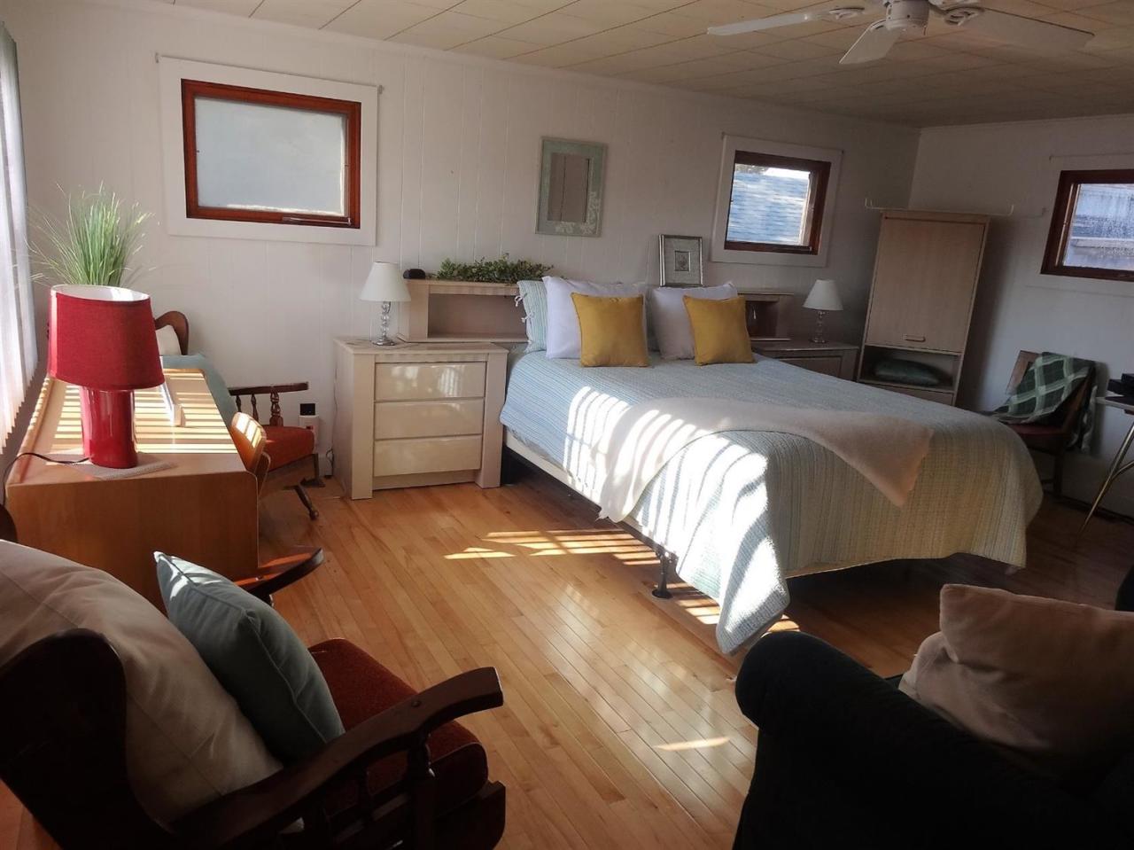 191 Captain Chase Road Dennis Port, MA 02639 - Photo 10 of 16 a bedroom with a bed and window