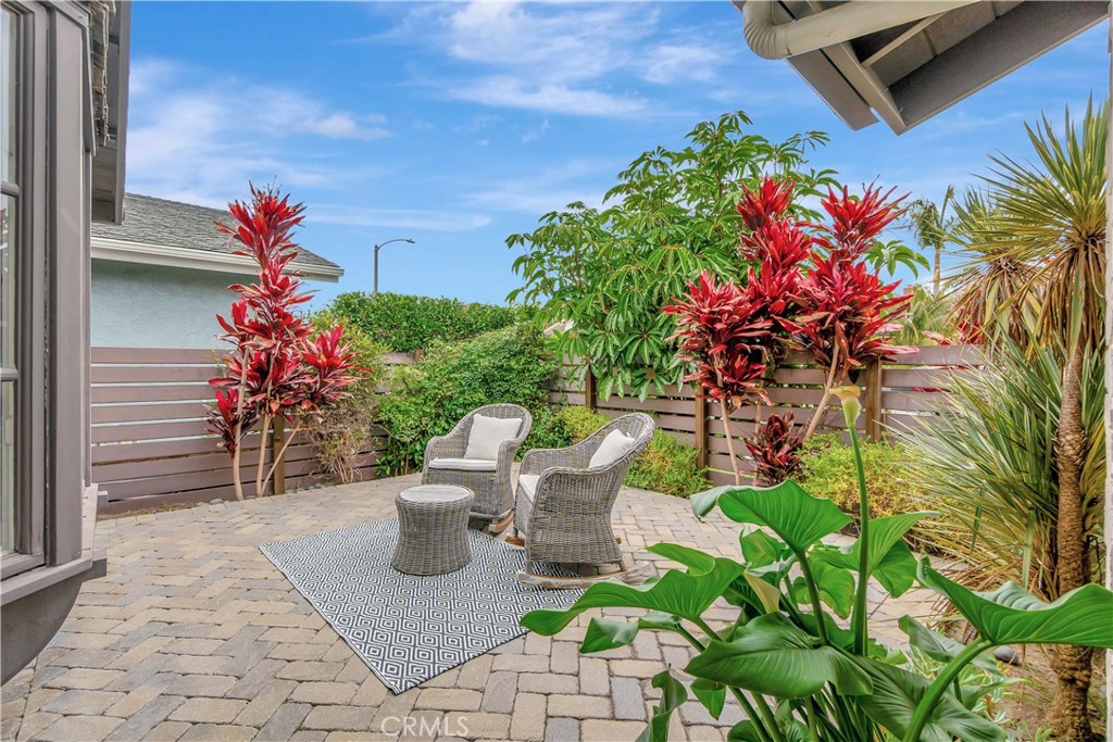 20151 Big Bend Lane Huntington Beach, CA 92646 - Photo 2 of 28 a front view of a house with a yard