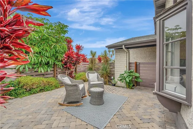 a house view with a garden space