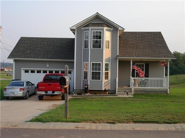 625 Avondale Road Oak Grove, KY 42262 - Photo 1 of 1 a front view of a house with a yard