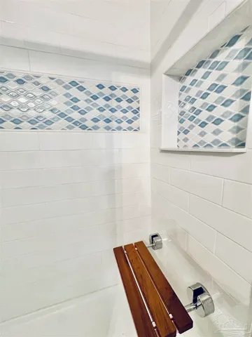 a bathroom with a bathtub