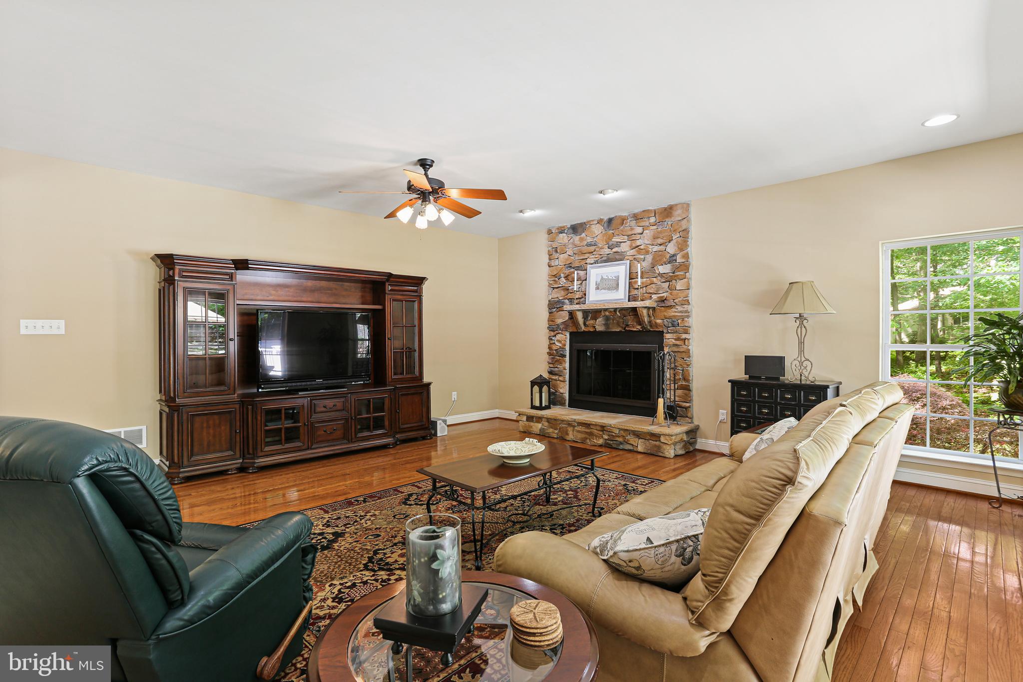 14439 Unionville Road Mount Airy, MD 21771 - Photo 19 of 57 Family room with Hardwood flooring