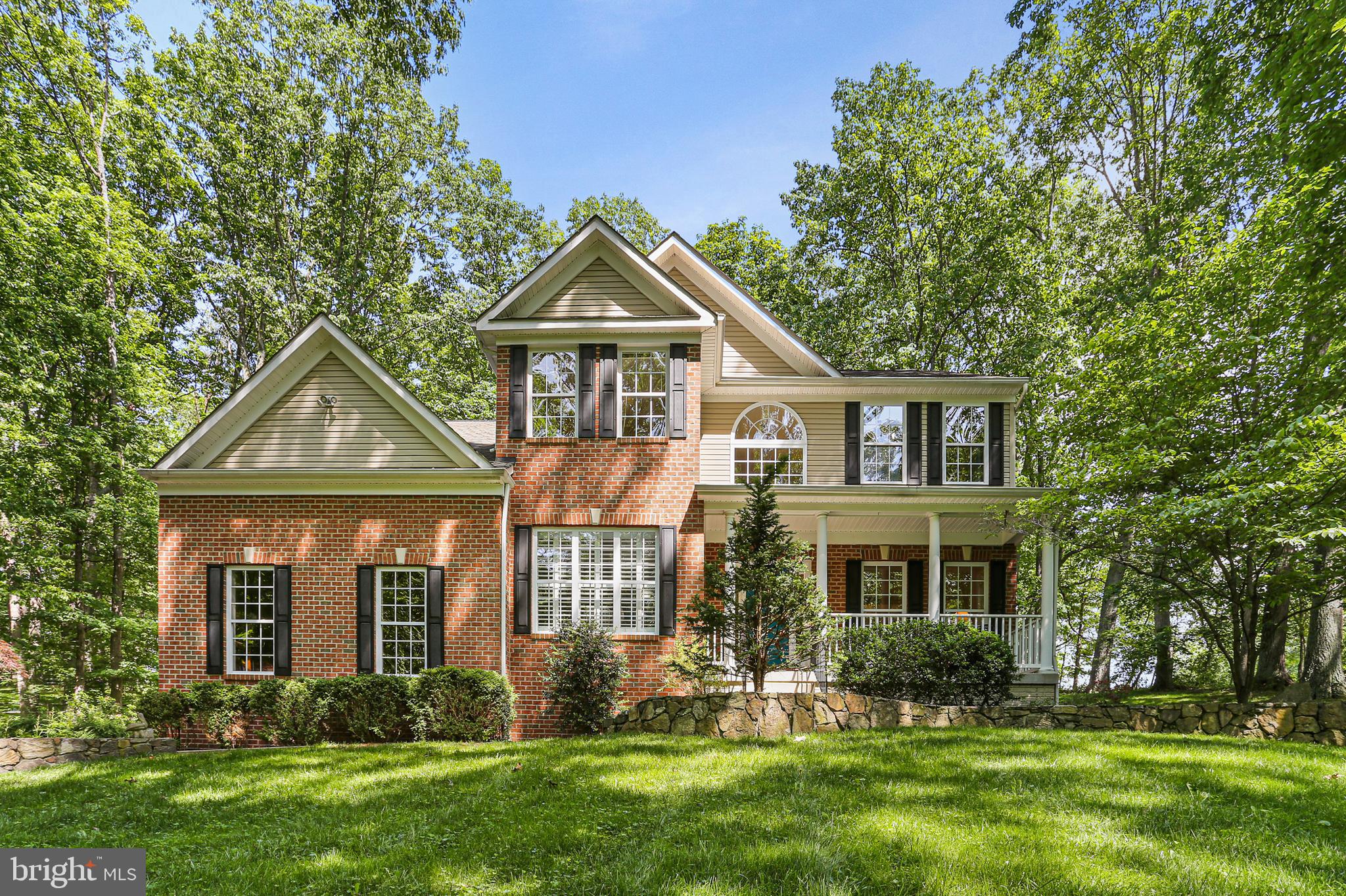 14439 Unionville Road Mount Airy, MD 21771 - Photo 39 of 57 Front exterior with covered front porch