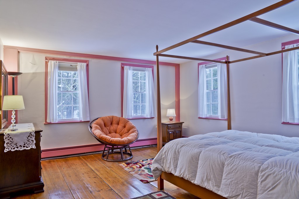 20 Topsfield Road Boxford, MA 01921 - Photo 18 of 30 a bedroom with a bed and window