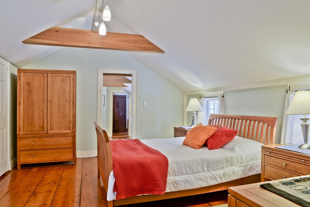 20 Topsfield Road Boxford, MA 01921 - Photo 19 of 30 a bedroom with a bed and wooden floor