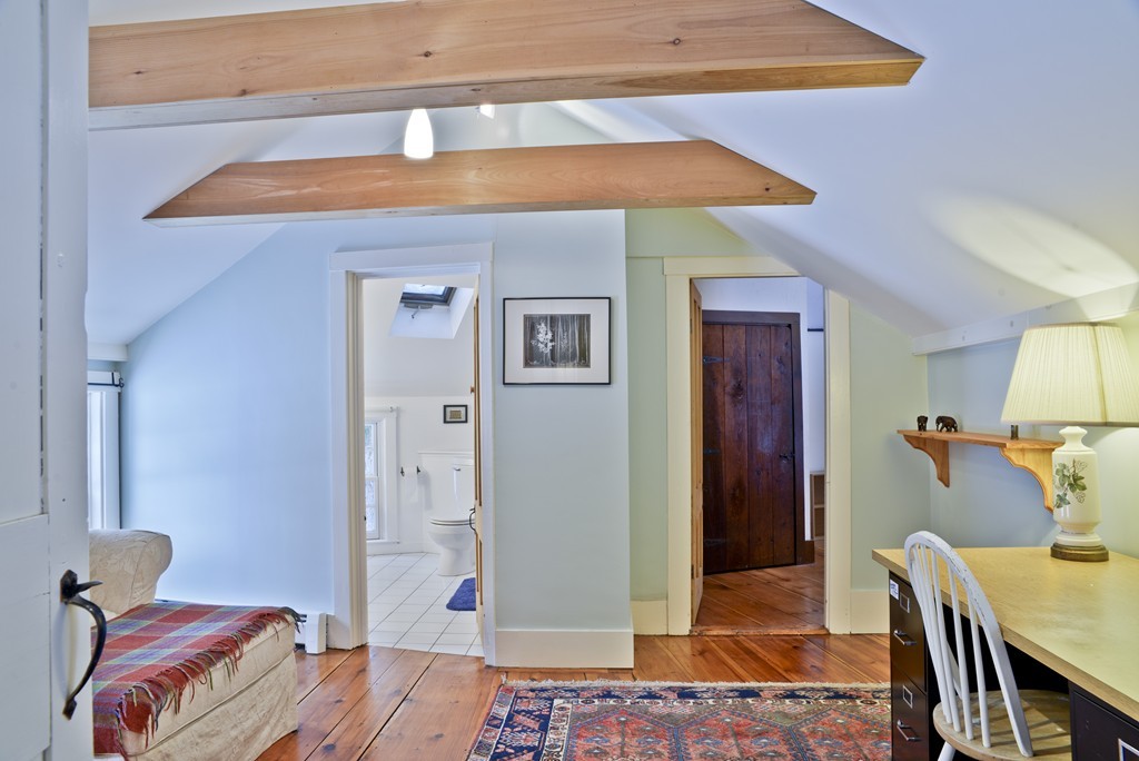 20 Topsfield Road Boxford, MA 01921 - Photo 20 of 30 a bedroom with a bed and a table