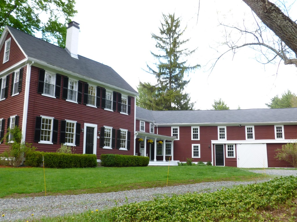 20 Topsfield Road Boxford, MA 01921 - Photo 29 of 30 a front view of a house with a garden and trees