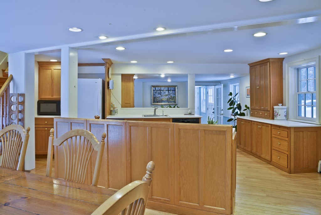 20 Topsfield Road Boxford, MA 01921 - Photo 5 of 30 a view of kitchen with stainless steel appliances granite countertop refrigerator stove a sink and dishwasher with wooden floor