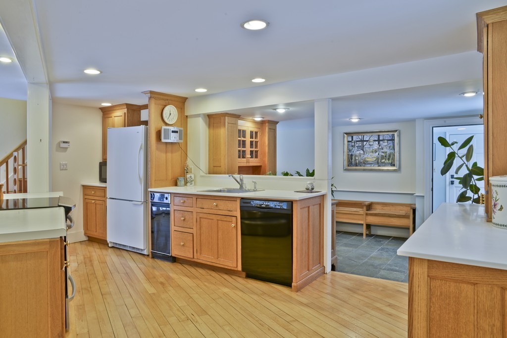 20 Topsfield Road Boxford, MA 01921 - Photo 6 of 30 a kitchen with stainless steel appliances granite countertop a sink stove and refrigerator