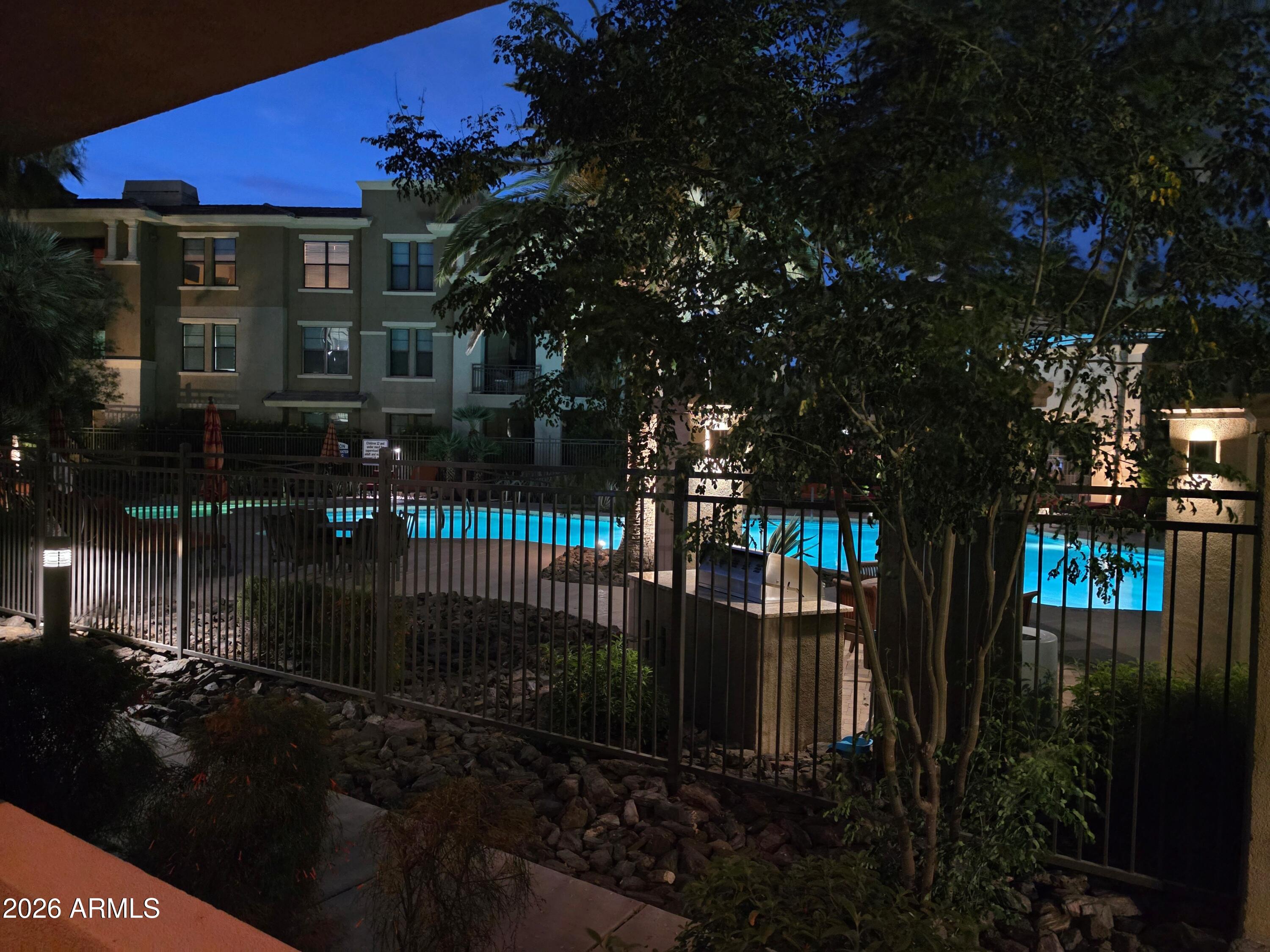 7601 East Indian Bend Road, Unit 1017 Scottsdale, AZ 85250 - Photo 32 of 49 a view of a building with a tree