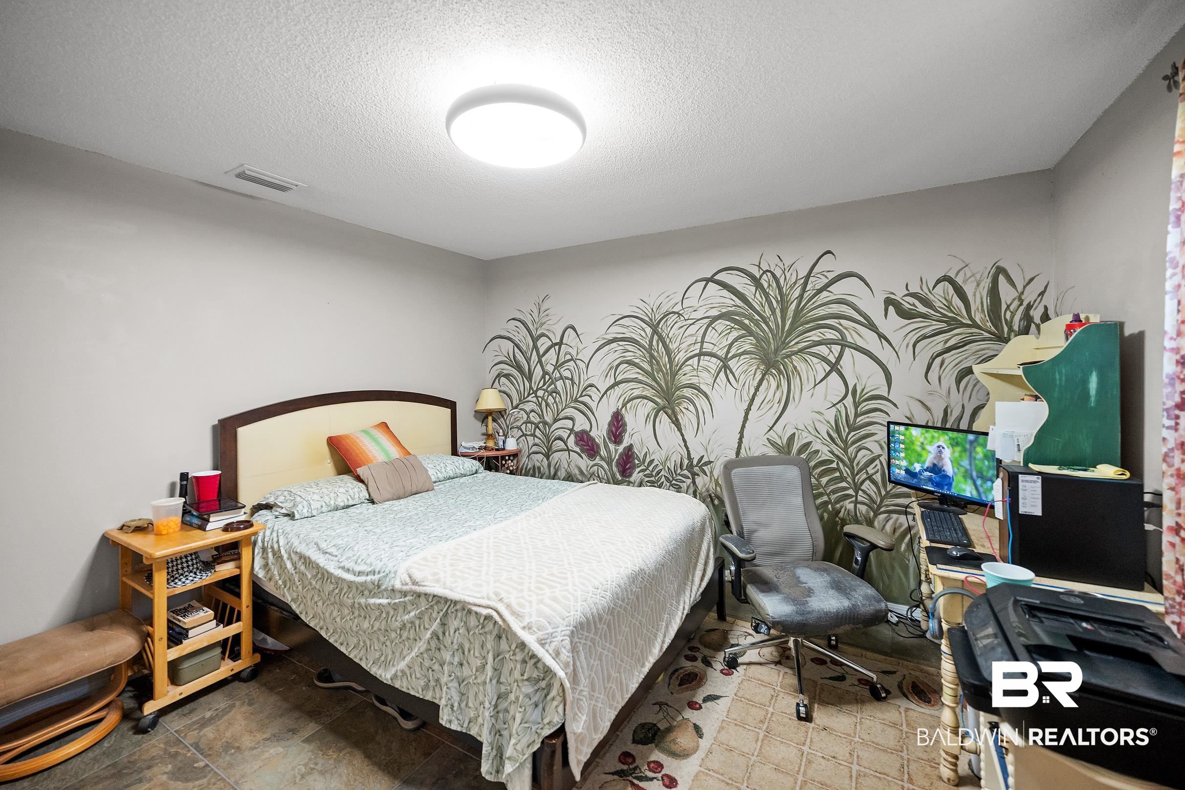 4026 Kingsrow Row Mobile, AL 36619 - Photo 35 of 51 Bedroom featuring a textured ceiling