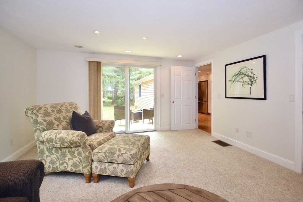 186 Sheaffer Road Barnstable, MA 02632 - Photo 15 of 29 a living room with furniture and large window
