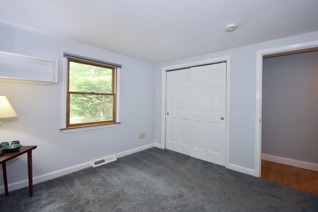 186 Sheaffer Road Barnstable, MA 02632 - Photo 20 of 29 a view of an empty room with a window