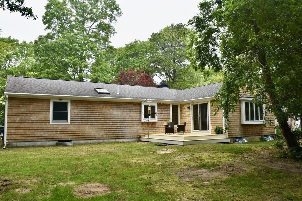 186 Sheaffer Road Barnstable, MA 02632 - Photo 25 of 29 a front view of a house with a yard