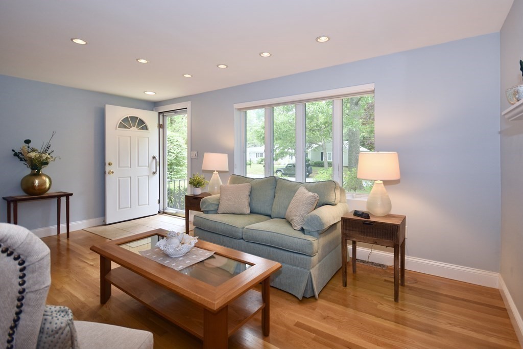 186 Sheaffer Road Barnstable, MA 02632 - Photo 5 of 29 a living room with furniture and a wooden floor