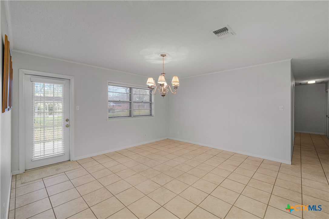 406 Blyth Road Victoria, TX 77904 - Photo 14 of 32 a view of an empty room with window