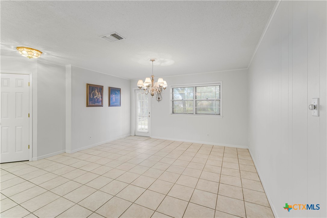 406 Blyth Road Victoria, TX 77904 - Photo 15 of 32 a view of an empty room and window