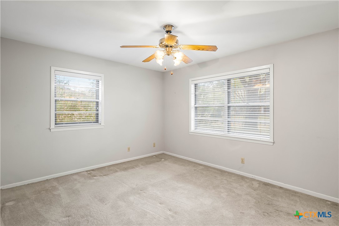 406 Blyth Road Victoria, TX 77904 - Photo 25 of 32 a view of an empty room with a window
