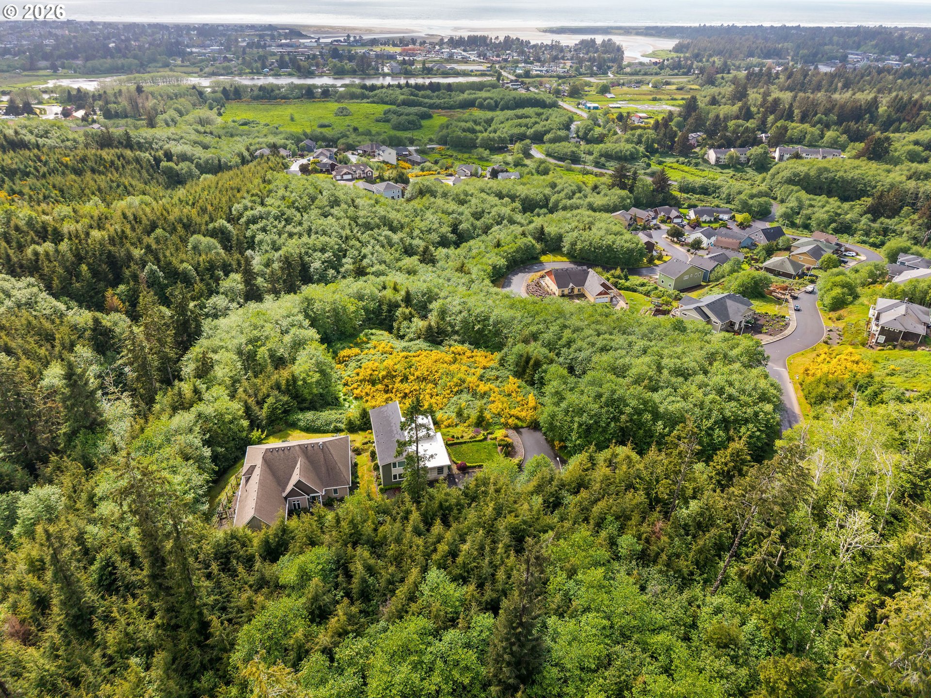 1915 North Fork Road Seaside, OR 97138 - Photo 7 of 12 an aerial view of a house with a yard