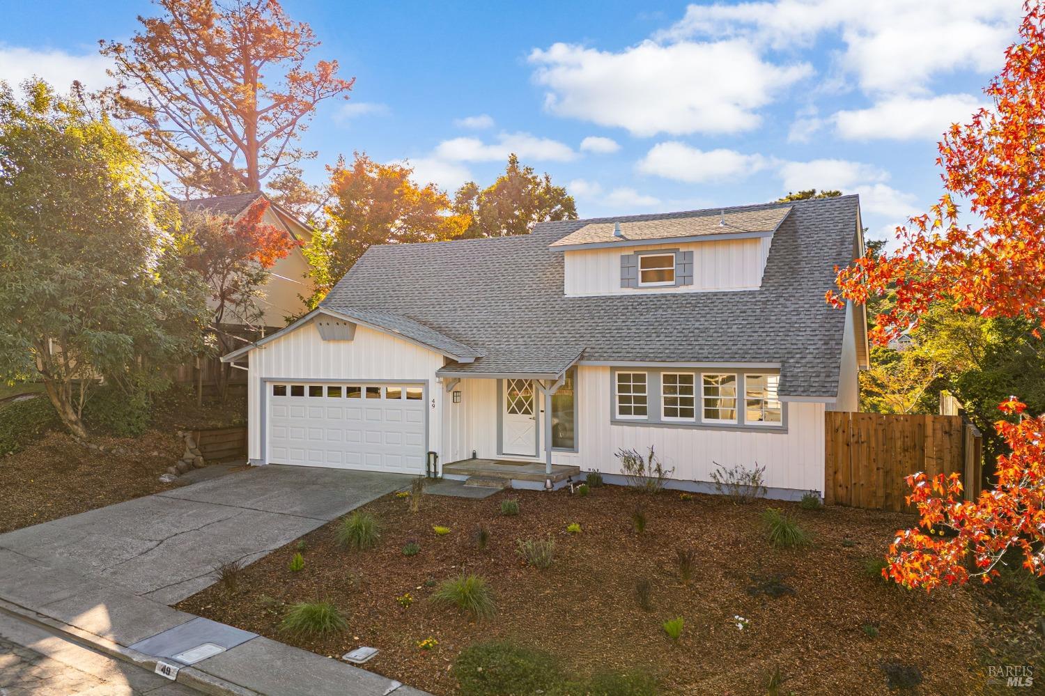 a view of a house with a garage