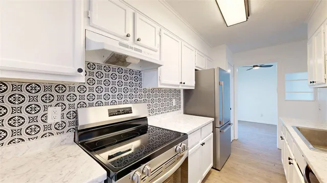 a close view of a sink and a mirror