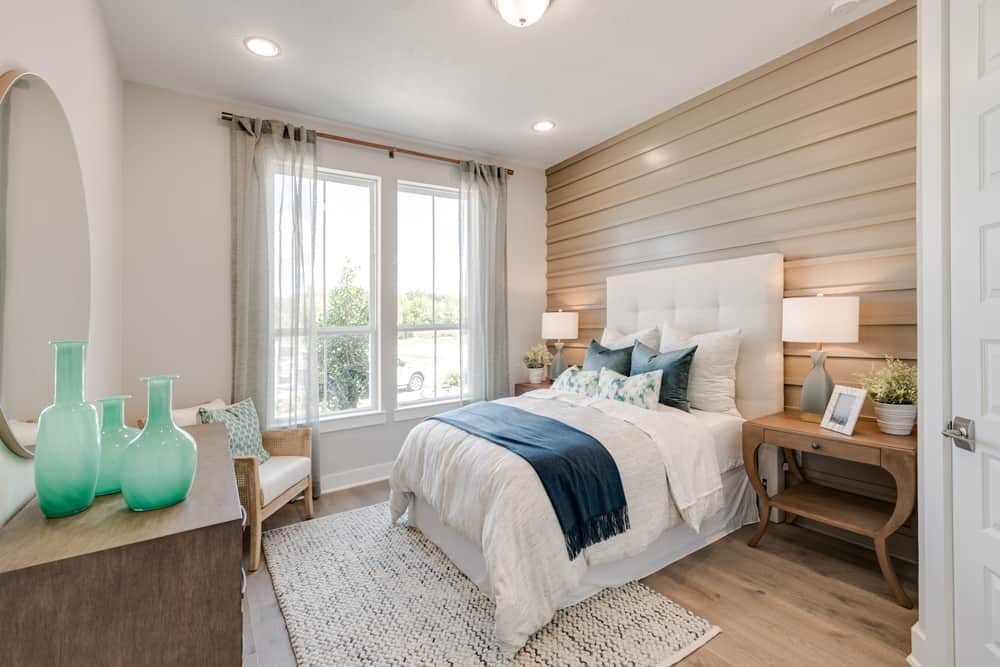 4811 Morning Spgs Drive Spring, TX 77386 - Photo 11 of 37 a bedroom with a bed and a couch