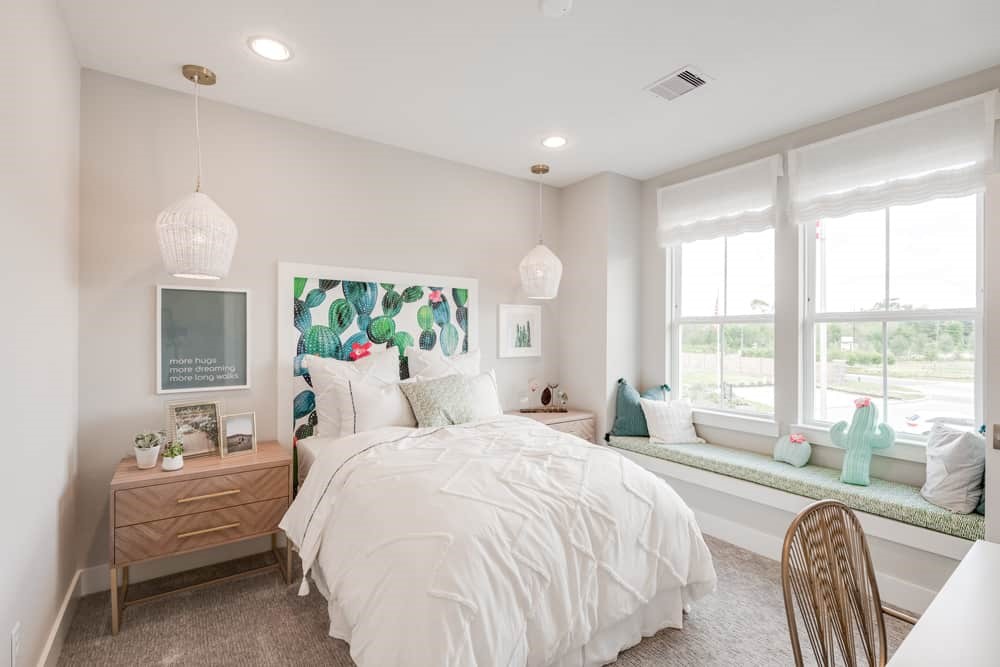 4811 Morning Spgs Drive Spring, TX 77386 - Photo 31 of 37 a spacious bedroom with a bed and large windows