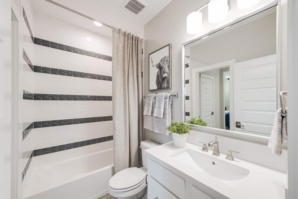 4811 Morning Spgs Drive Spring, TX 77386 - Photo 33 of 37 a bathroom with a sink toilet and shower