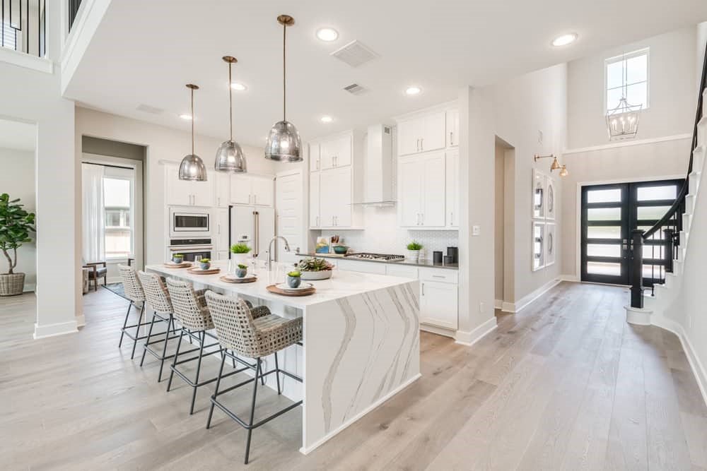 4811 Morning Spgs Drive Spring, TX 77386 - Photo 5 of 37 a large kitchen with a table and chairs