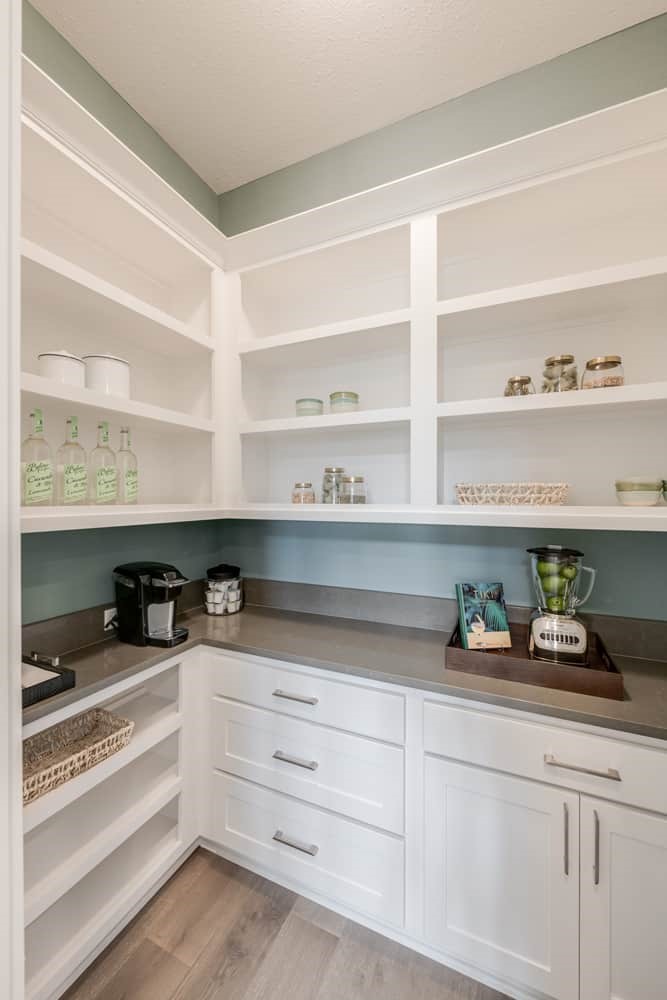 4811 Morning Spgs Drive Spring, TX 77386 - Photo 6 of 37 a kitchen with white cabinets and window
