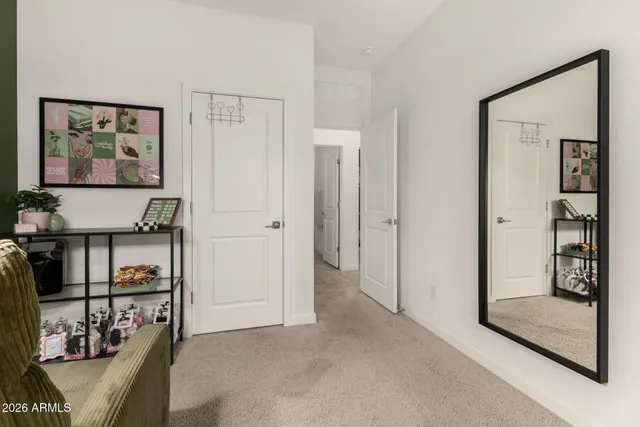 a view of a livingroom with furniture and door