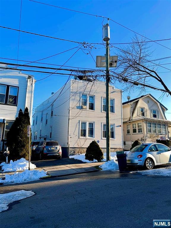 a car parked in front of a house