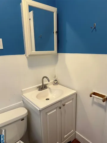 a bathroom with a sink and a toilet