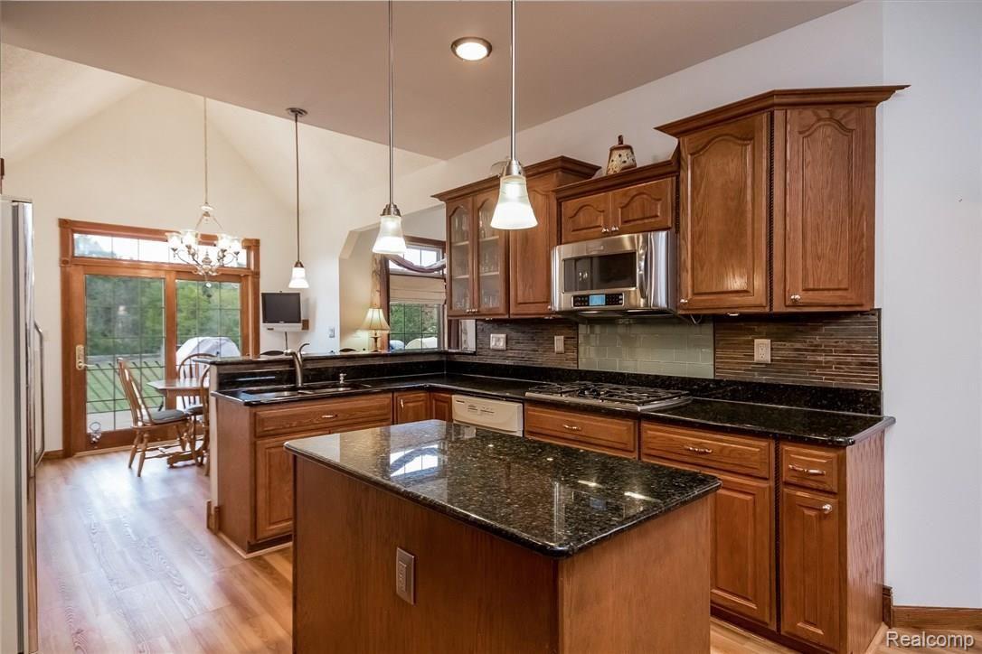 23835 Elwell Road Belleville, MI 48111 - Photo 15 of 78 GLEAMING GRANITE COUNTERTOPS