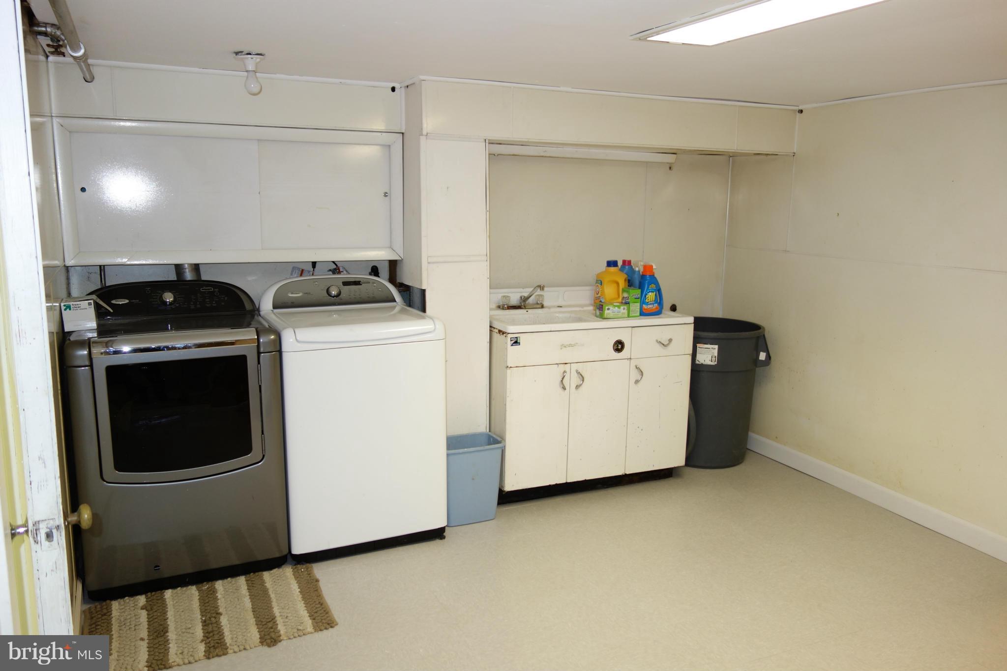 407 Gralan Road Catonsville, MD 21228 - Photo 23 of 30 Laundry Room with new flooring
