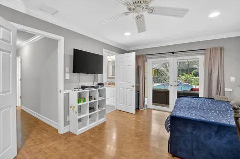 a view of living room with furniture and flat screen tv