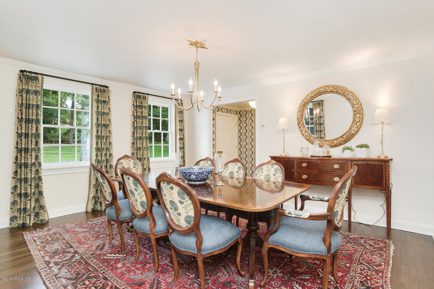 418 Riversville Road Greenwich, CT 06831 - Photo 17 of 38 a view of a dining room with furniture window and wooden floor