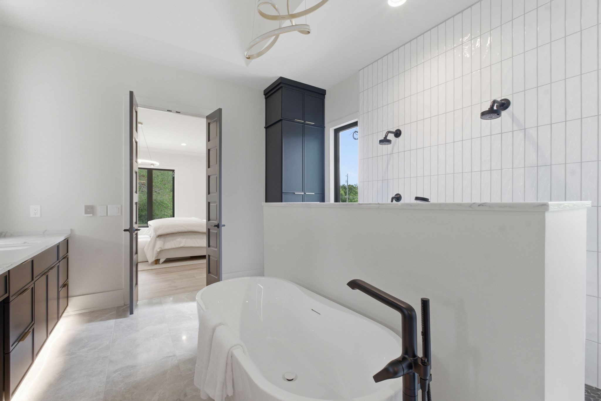 1002 Waller Road Brentwood, TN 37027 - Photo 30 of 54 a bathroom with a bathtub and a sink