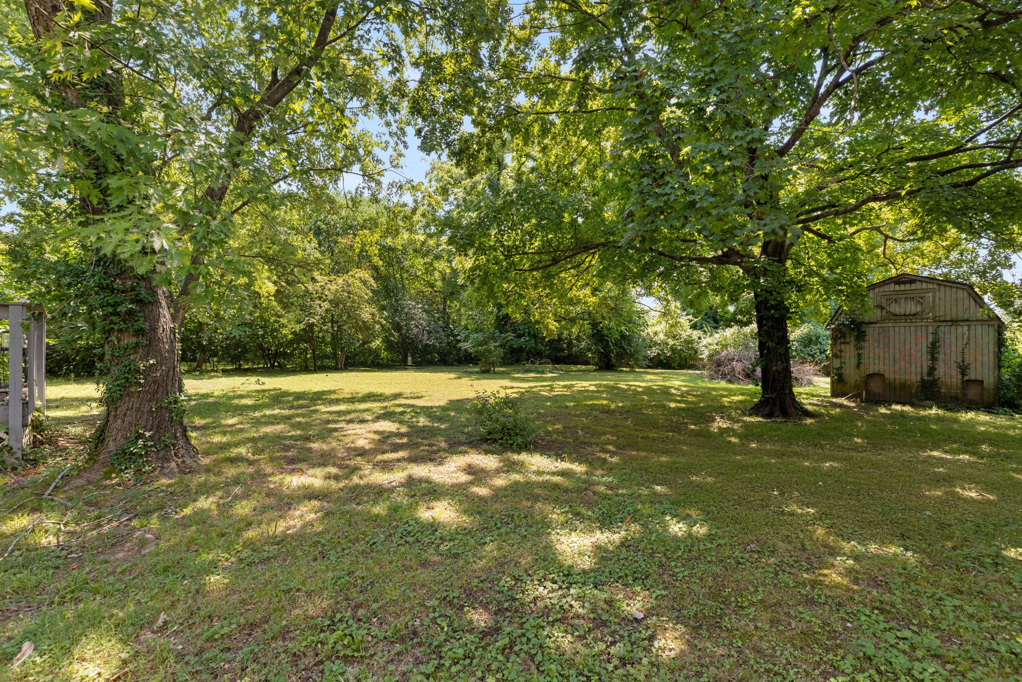 532 East Maple Street Madison, TN 37115 - Photo 7 of 14 a view of outdoor space with deck and yard