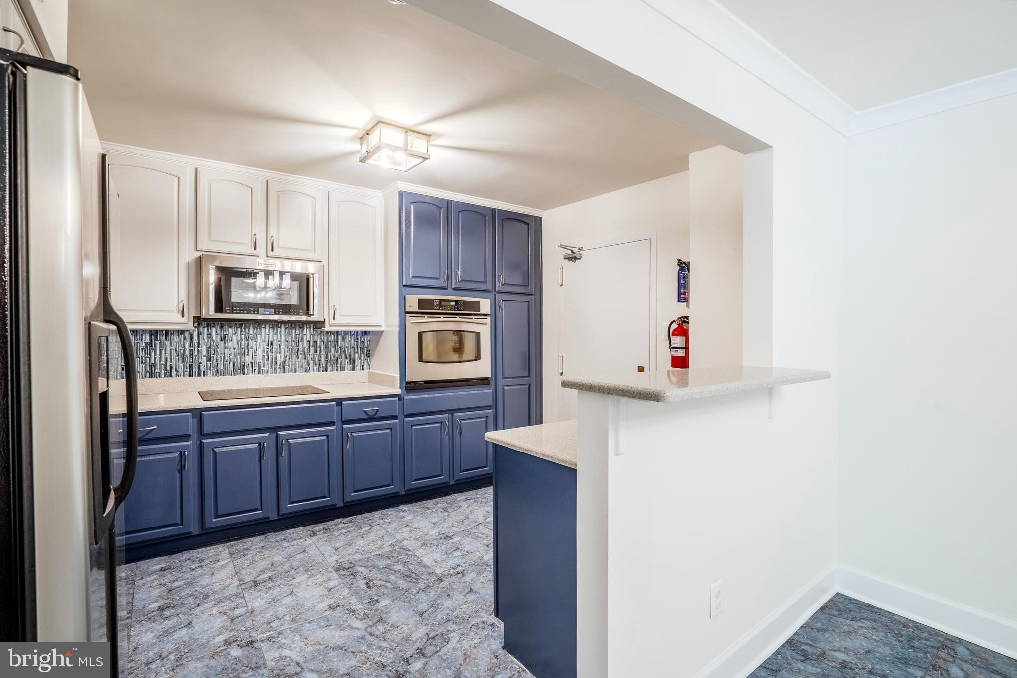 1800 Old Meadow Road, Unit 218 McLean, VA 22102 - Photo 8 of 57 Microwave & wall oven