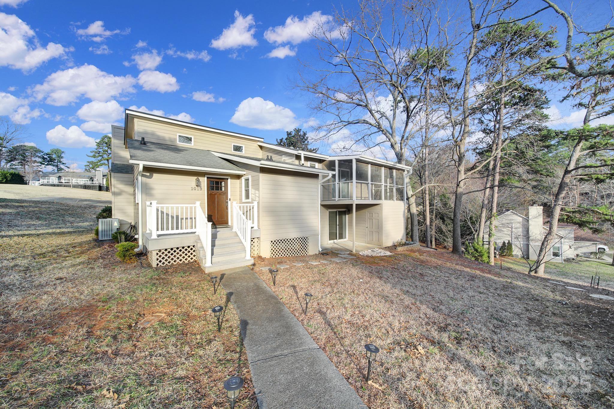 1019 Palmyra Drive Tega Cay, SC 29708 - Photo 1 of 42 a view of a house with a yard