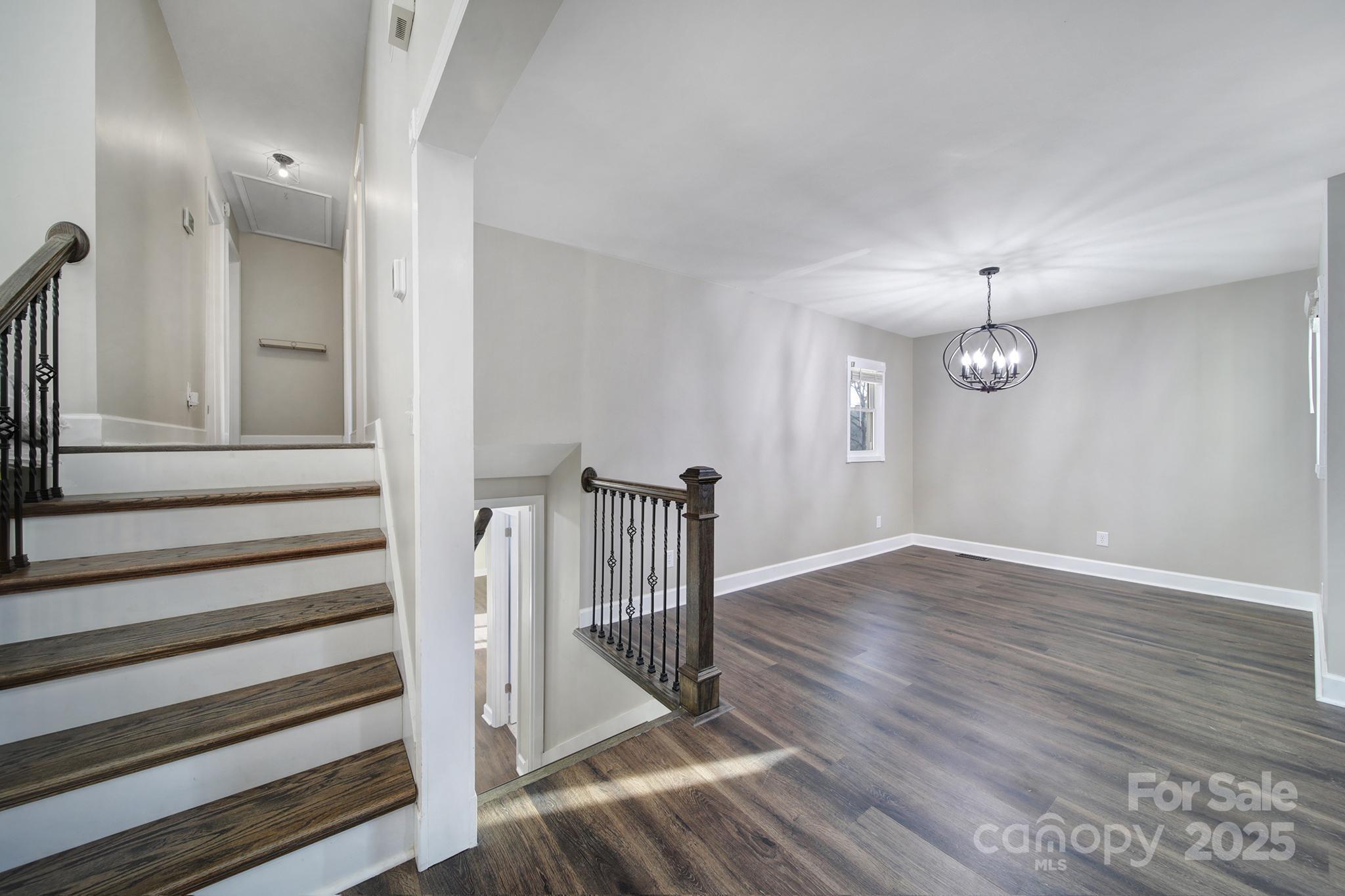 1019 Palmyra Drive Tega Cay, SC 29708 - Photo 17 of 42 a view of entryway with wooden floor