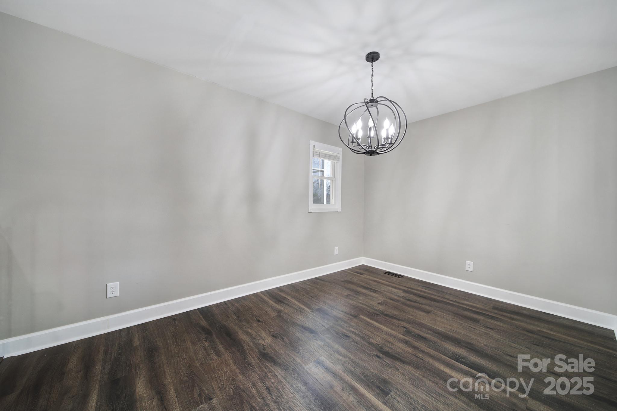 1019 Palmyra Drive Tega Cay, SC 29708 - Photo 18 of 42 a view of a room with wooden floor fan and window