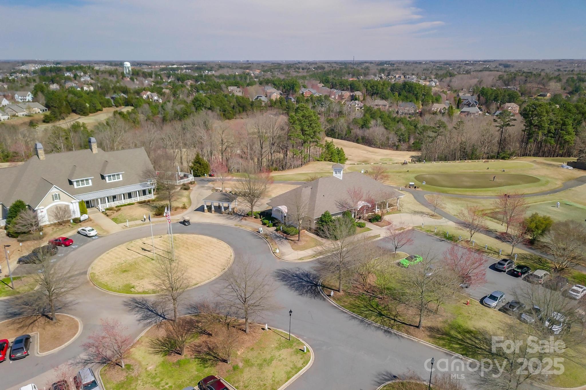1019 Palmyra Drive Tega Cay, SC 29708 - Photo 40 of 42 a view of a swimming pool with a yard