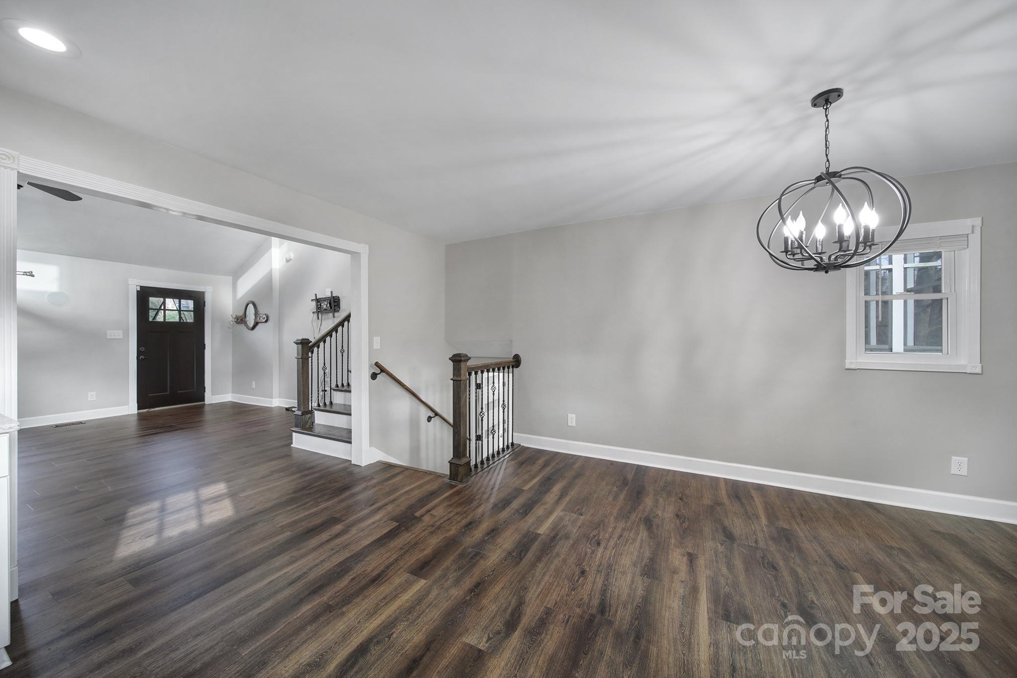 1019 Palmyra Drive Tega Cay, SC 29708 - Photo 7 of 42 a view of empty room with wooden floor