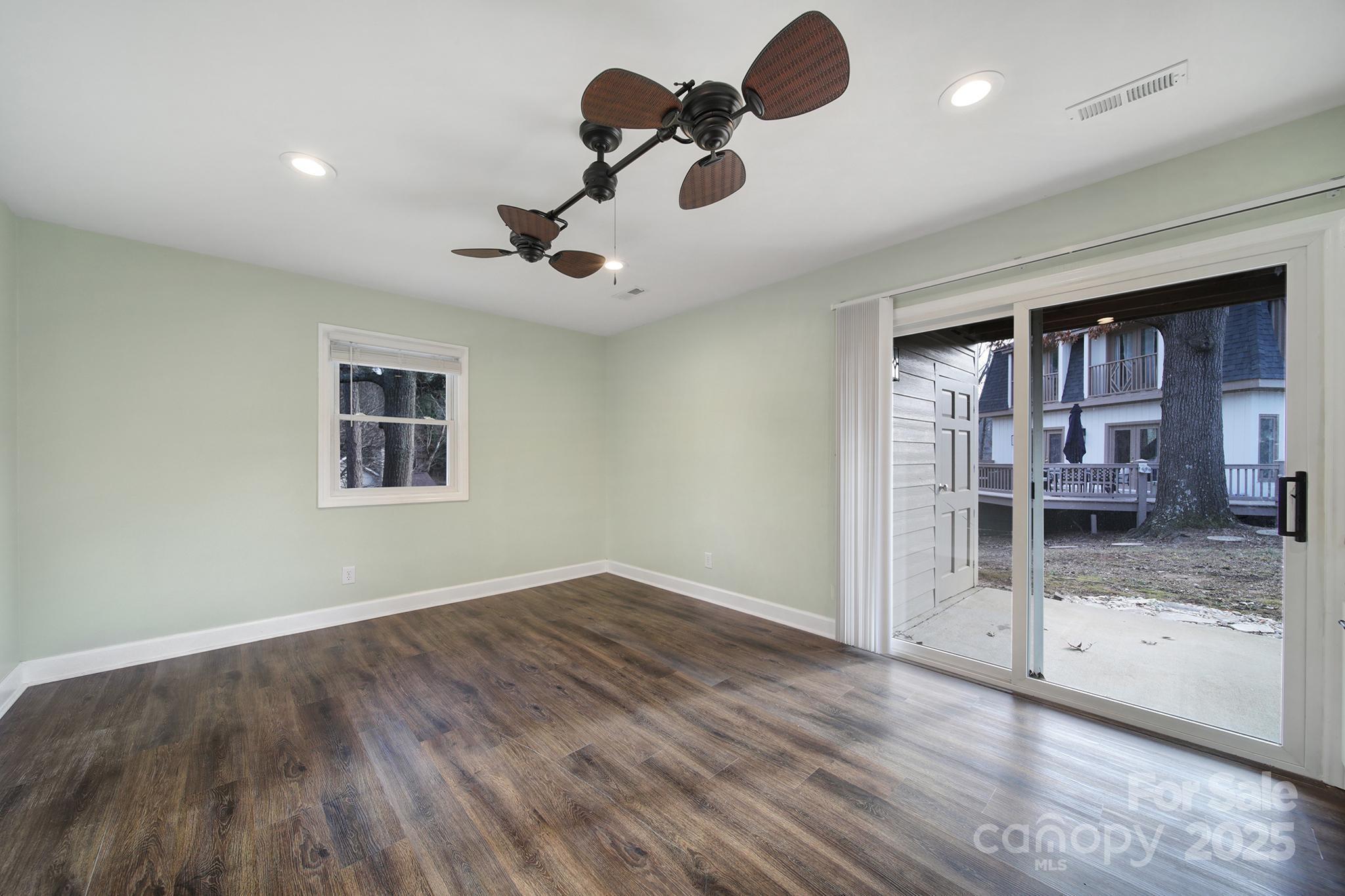 1019 Palmyra Drive Tega Cay, SC 29708 - Photo 10 of 42 a view of livingroom and kitchen with wooden floor
